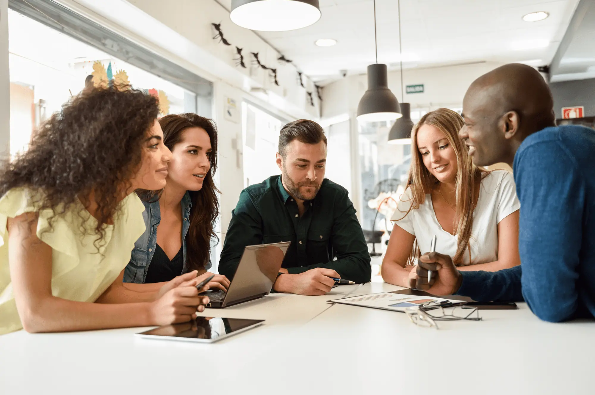 A group of business professionals attending an in-person language course.